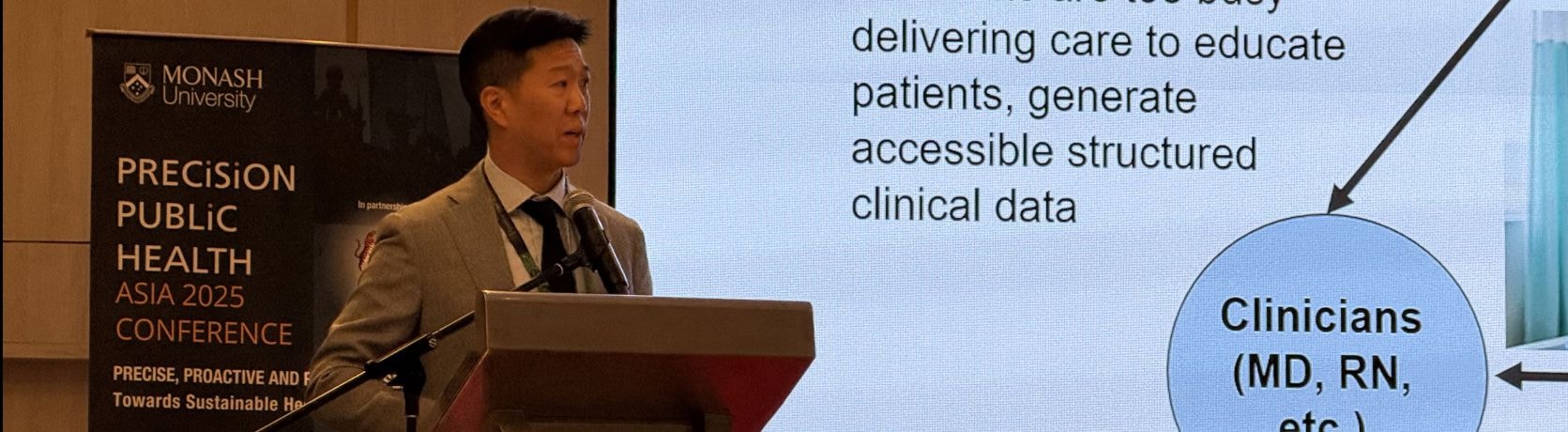 Dr. Ernest Lo, Senior Medical Director at Roche Information Solutions, giving a speech at PPHA 2025.