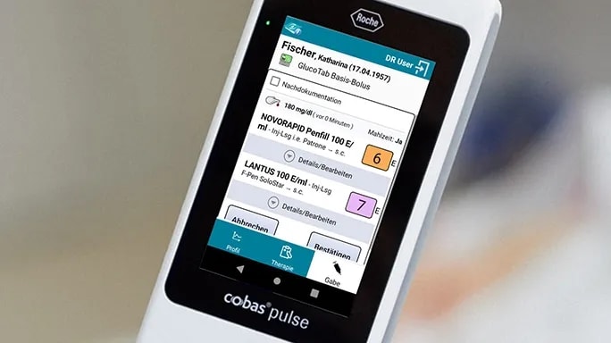 The cobas® pulse system displaying the GlucoTab® application, showing patient details and insulin dosage recommendations for hospital staff.